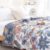 CottonBloom Blanket – Rustikale Baumwoll-Decke mit Blumenmuster, Wende-Design
