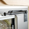 Magnetic kitchen roll holder including metal bar