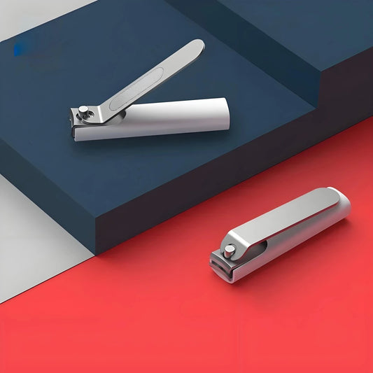 STEELTRIM – Cortauñas con lima y protector contra salpicaduras